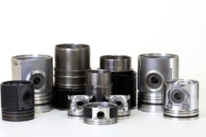 auto piston parts white background isolated